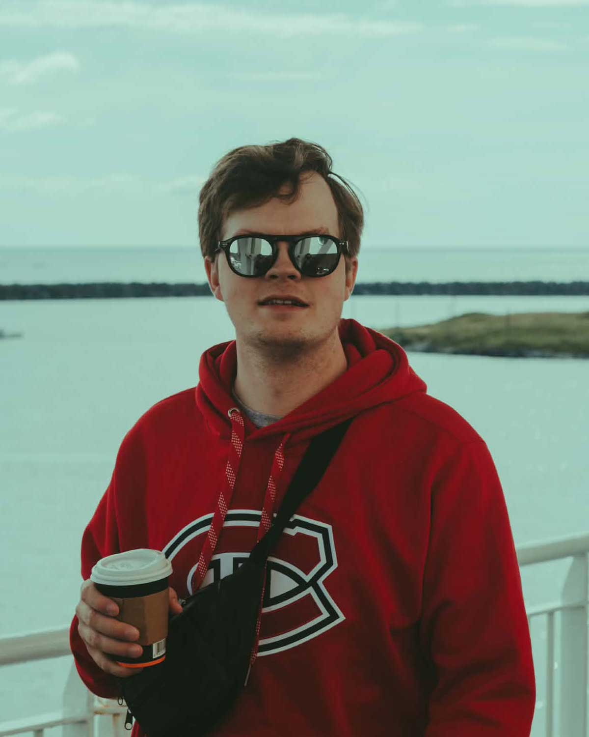 Man smiling on newfoundland ferry.