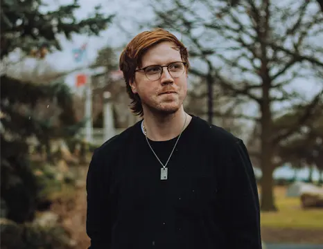 withcaremedia founder addison johnson posing for the camera