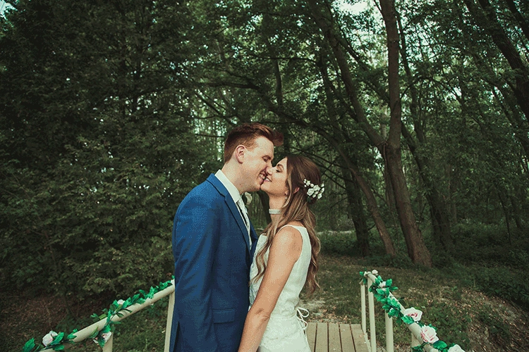 Photographer looking at the photo he just took.